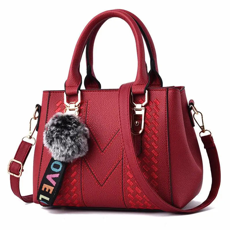 The Verona Signature Satchel