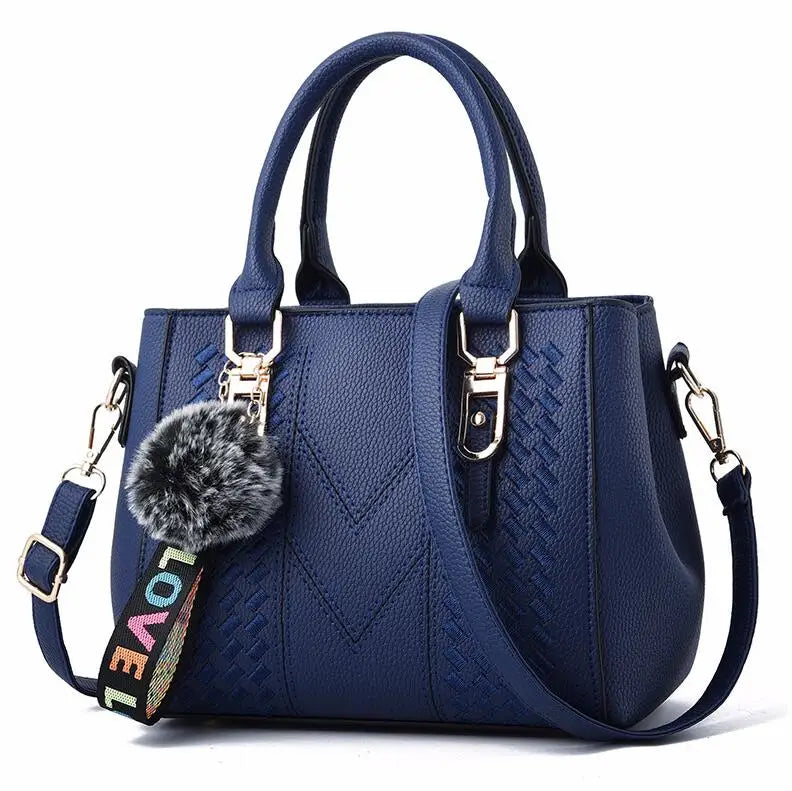 The Verona Signature Satchel