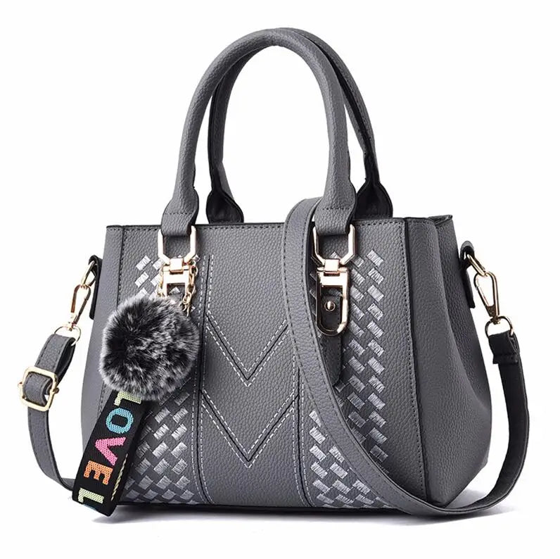 The Verona Signature Satchel